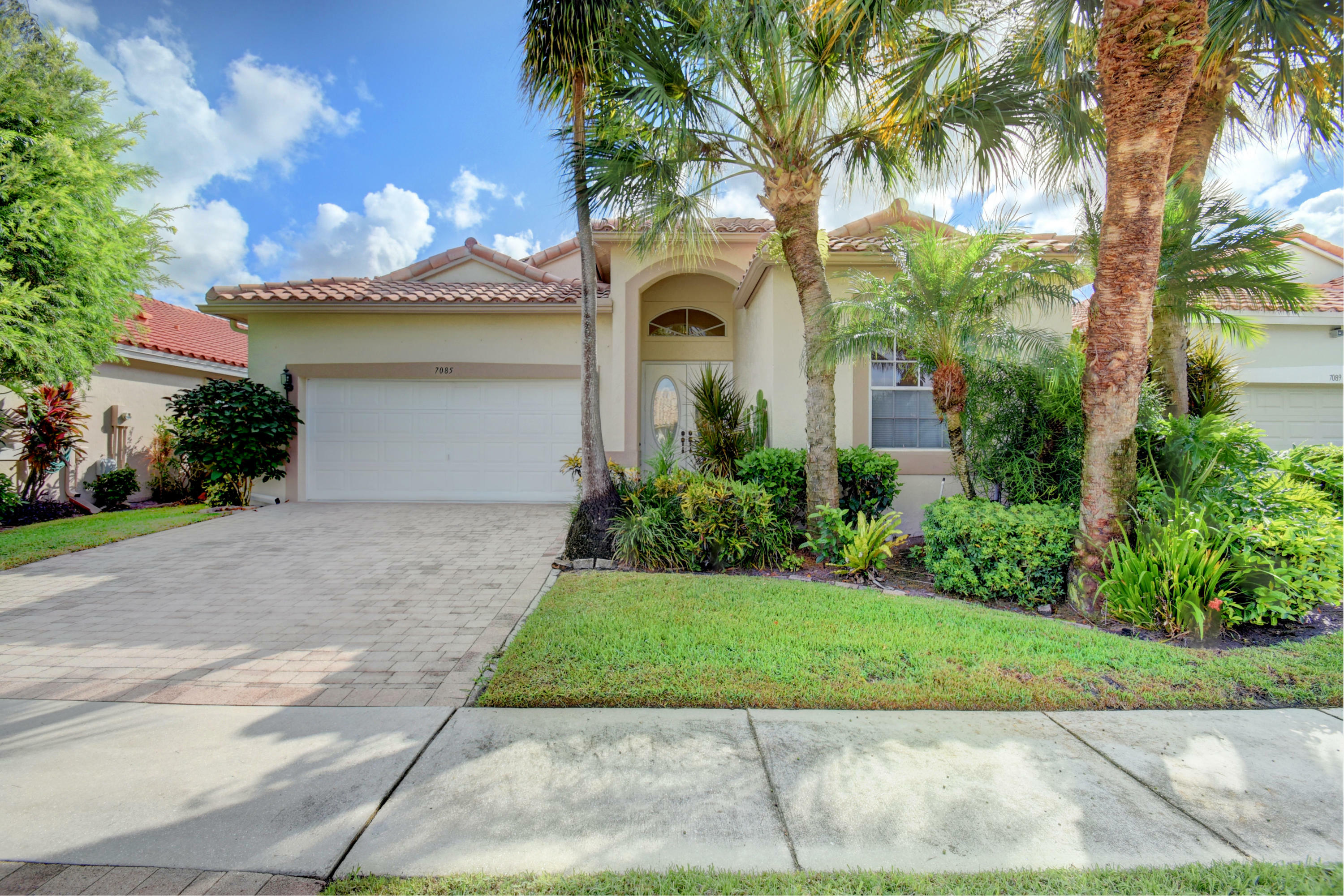 Property Photo:  7085 Haviland Circle  FL 33437 