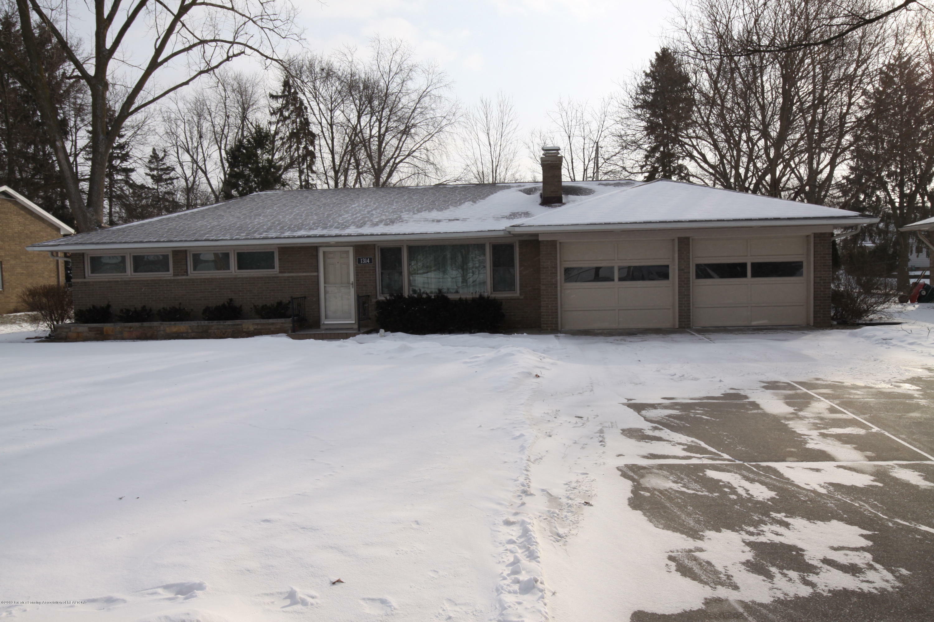 Property Photo:  1314 Wood Street  MI 48912 