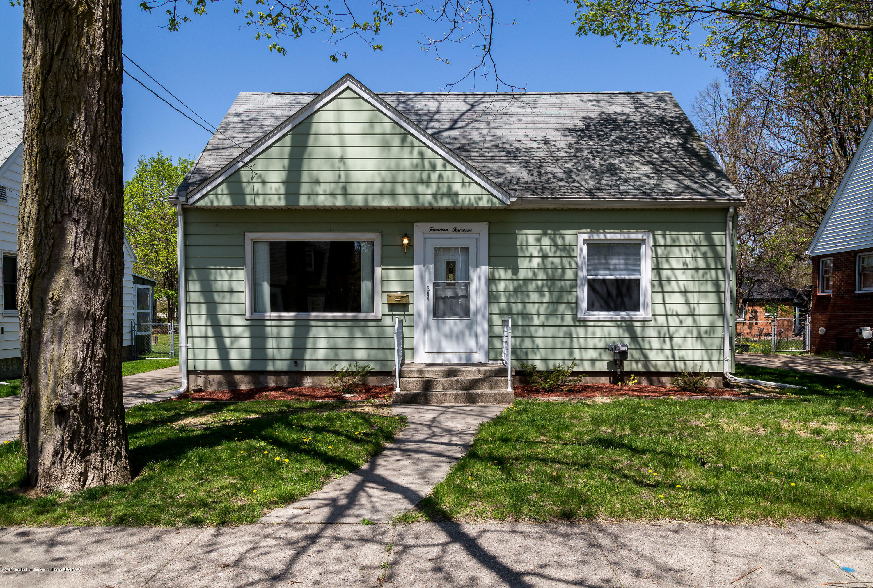 Property Photo:  1414 Victor Avenue  MI 48910 