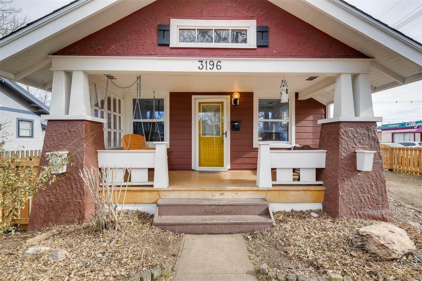 Property Photo:  3196 S Acoma Street  CO 80110 