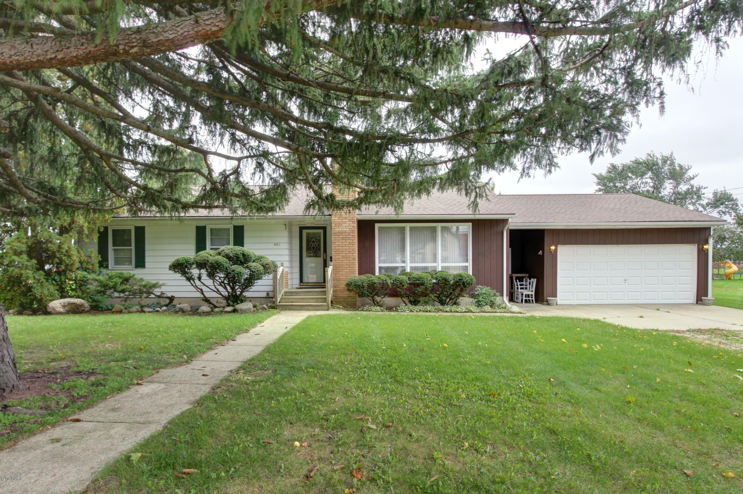 Property Photo:  401 W Maple Street  MI 48414 