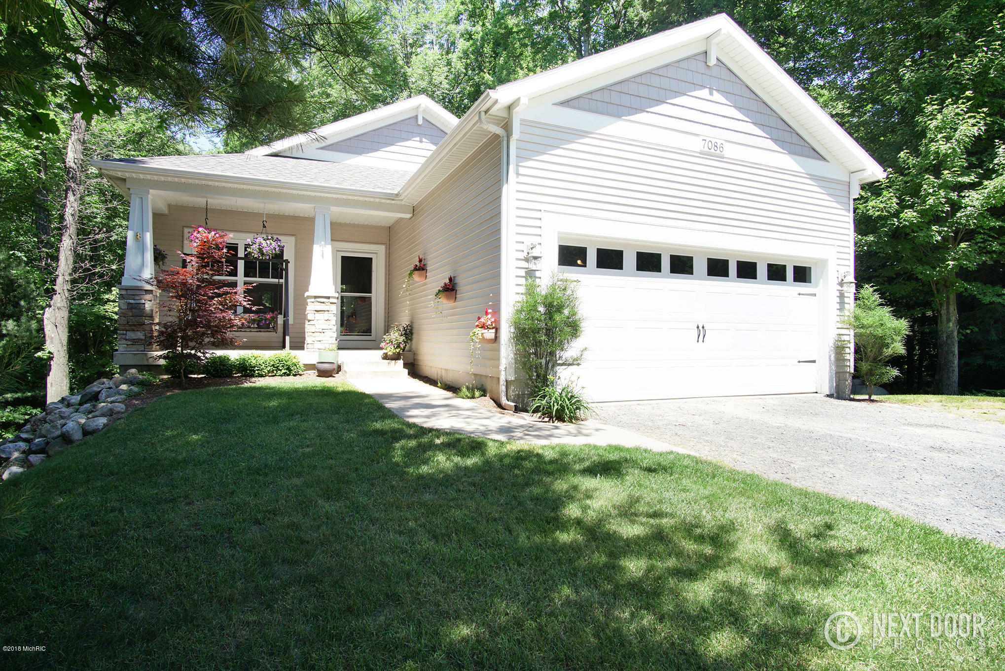 Property Photo:  7086 Crescent Drive  MI 49449 