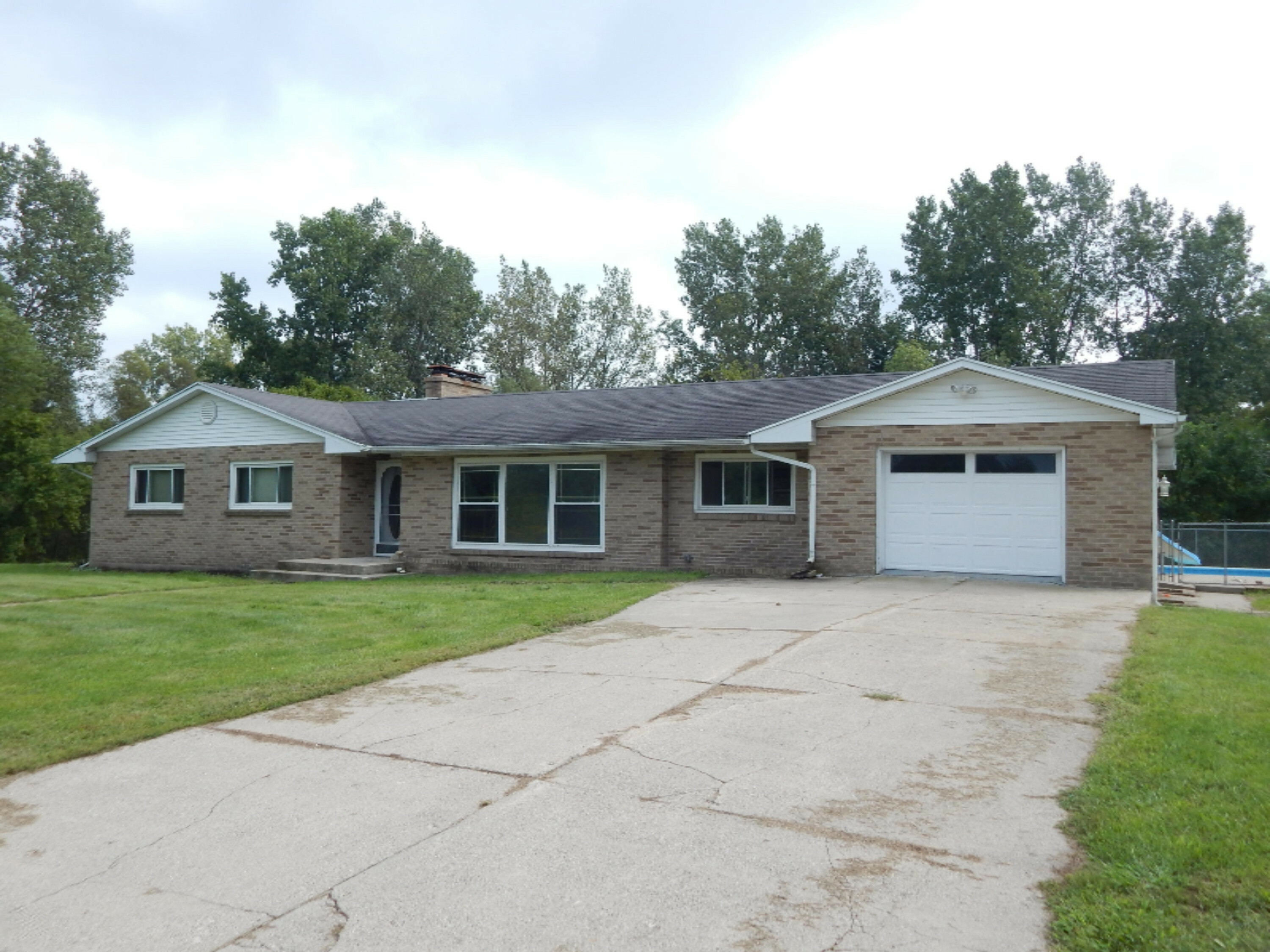 Property Photo:  88 Ostman Drive  MI 49345 