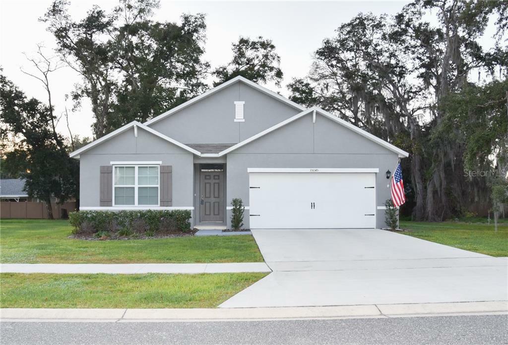 Property Photo:  35045 Sweet Leaf Lane  FL 34788 