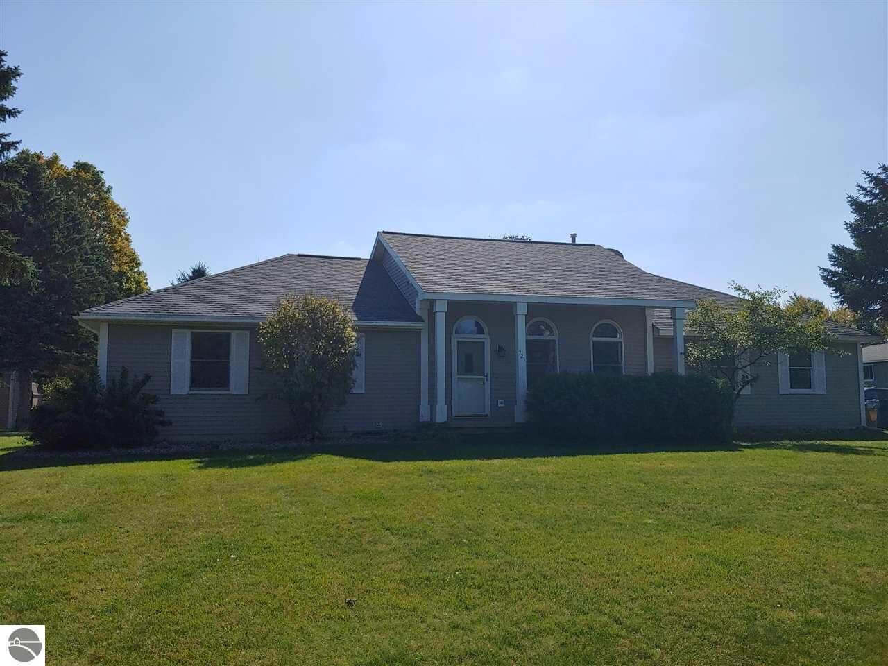 Property Photo:  721 Holly Road  MI 49601 