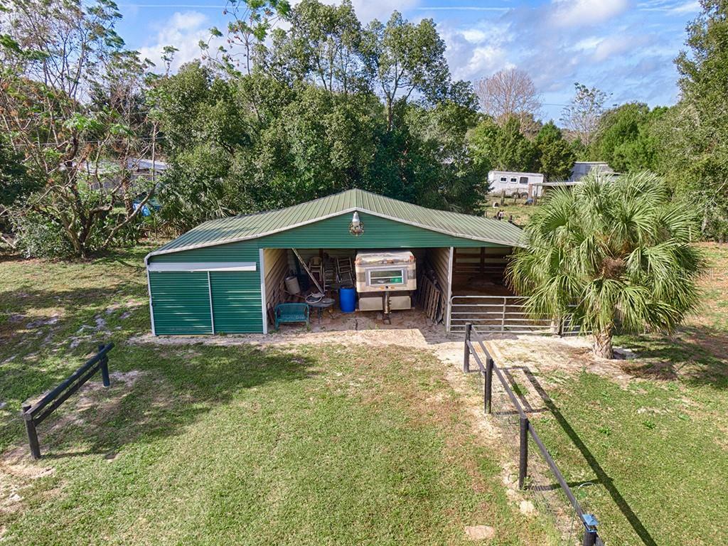 Property Photo:  10853 S Em En El Grove Road  FL 34788 