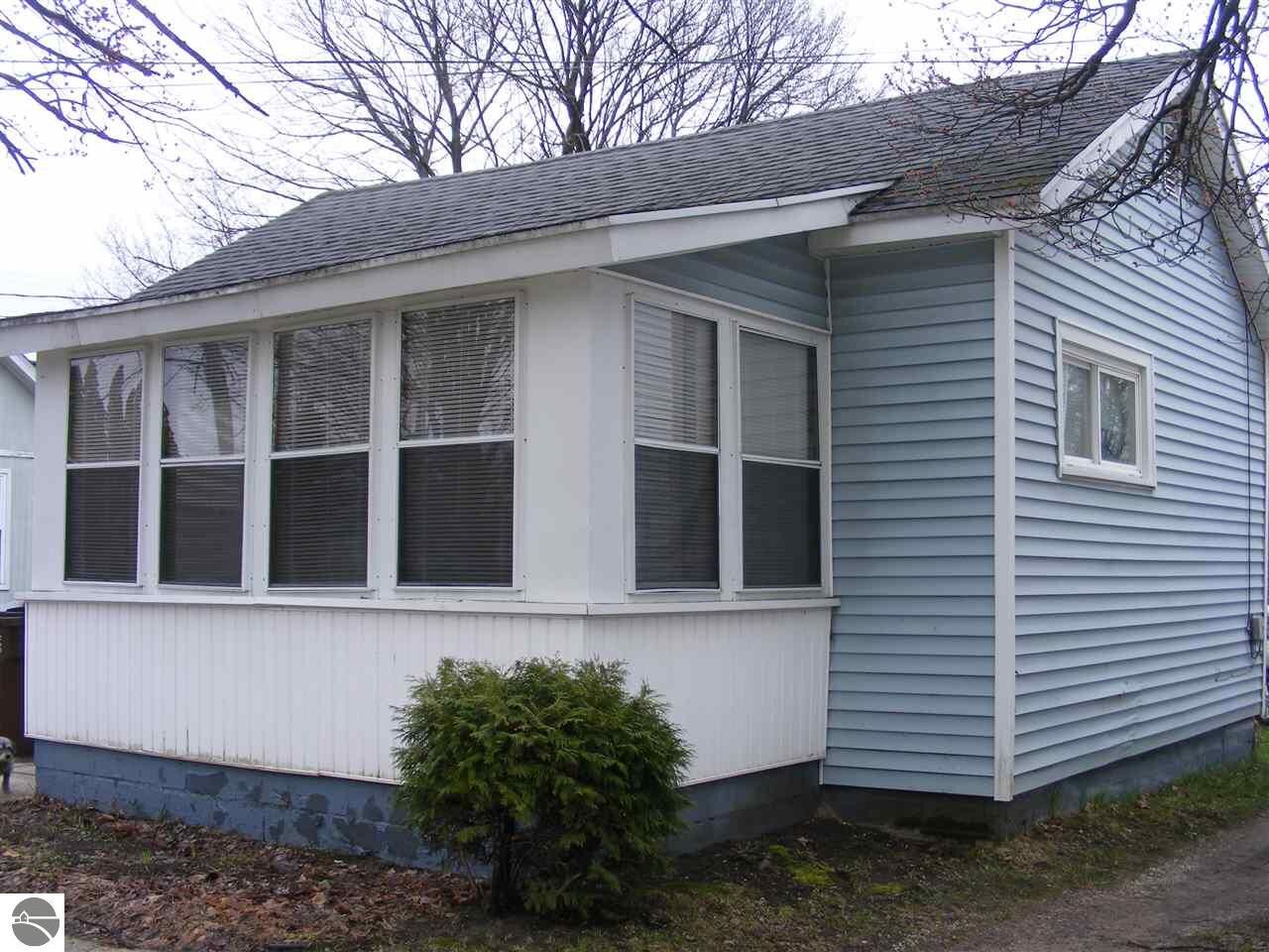 Property Photo:  213 Cottage  MI 49601 