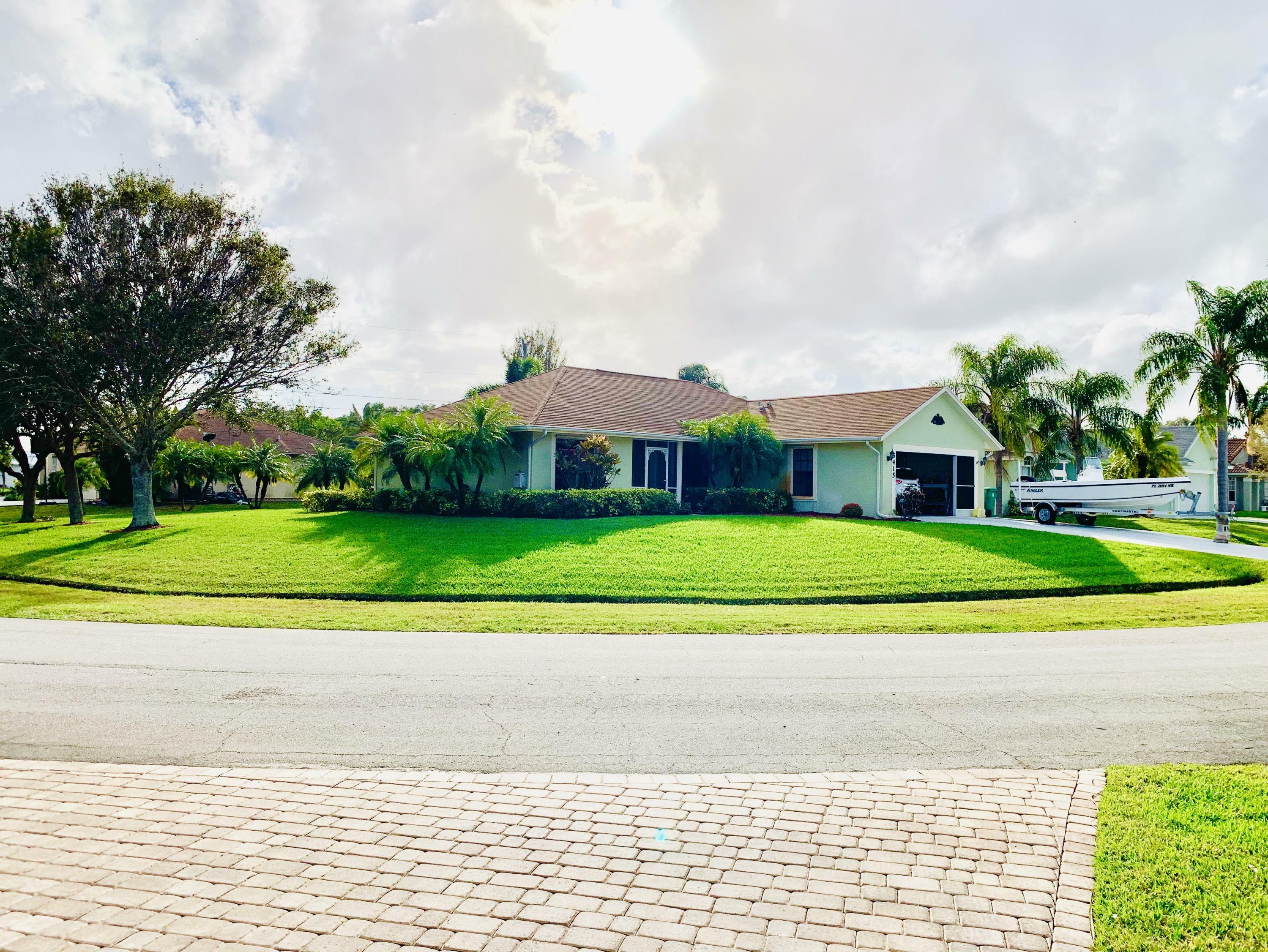 Property Photo:  5415 NW Clark Avenue  FL 34983 