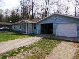 Property Photo:  3975 County Road 489  MI 49765 