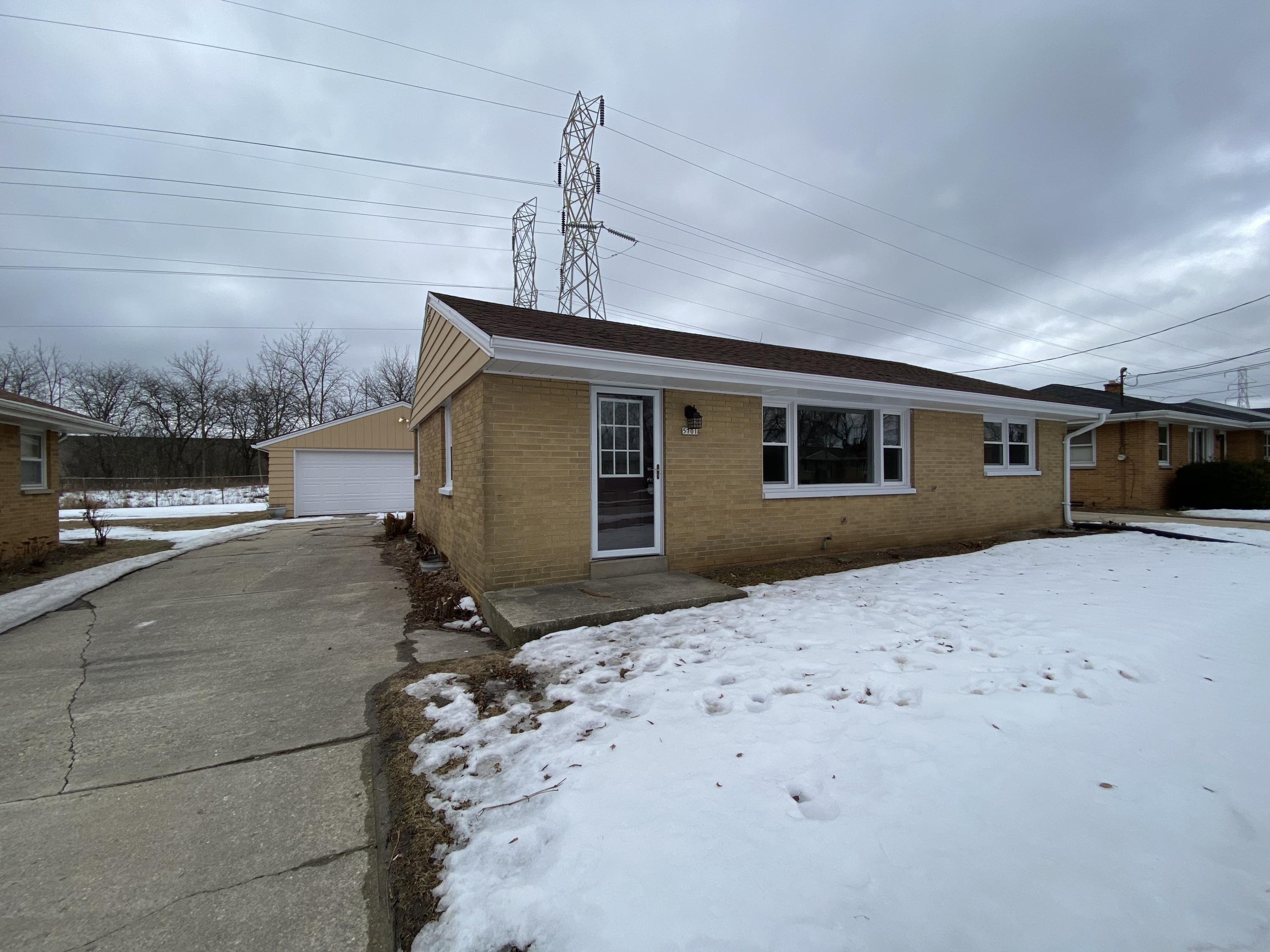 Property Photo:  5701 W Allerton Ave  WI 53220 