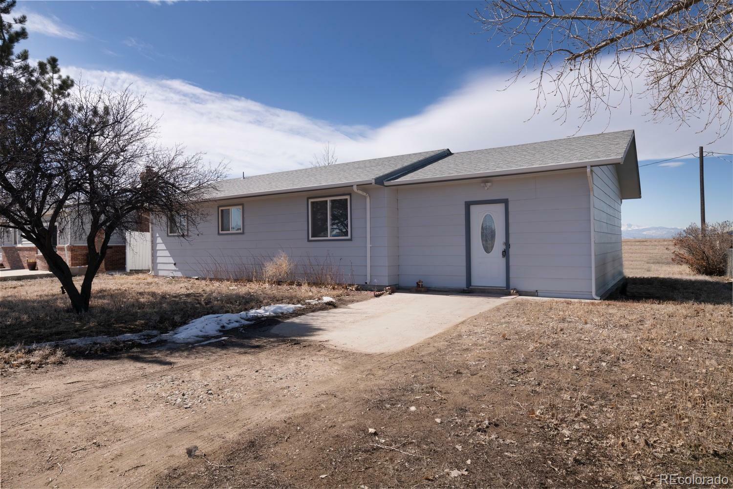 Property Photo:  1003 Elm Street  CO 80623 