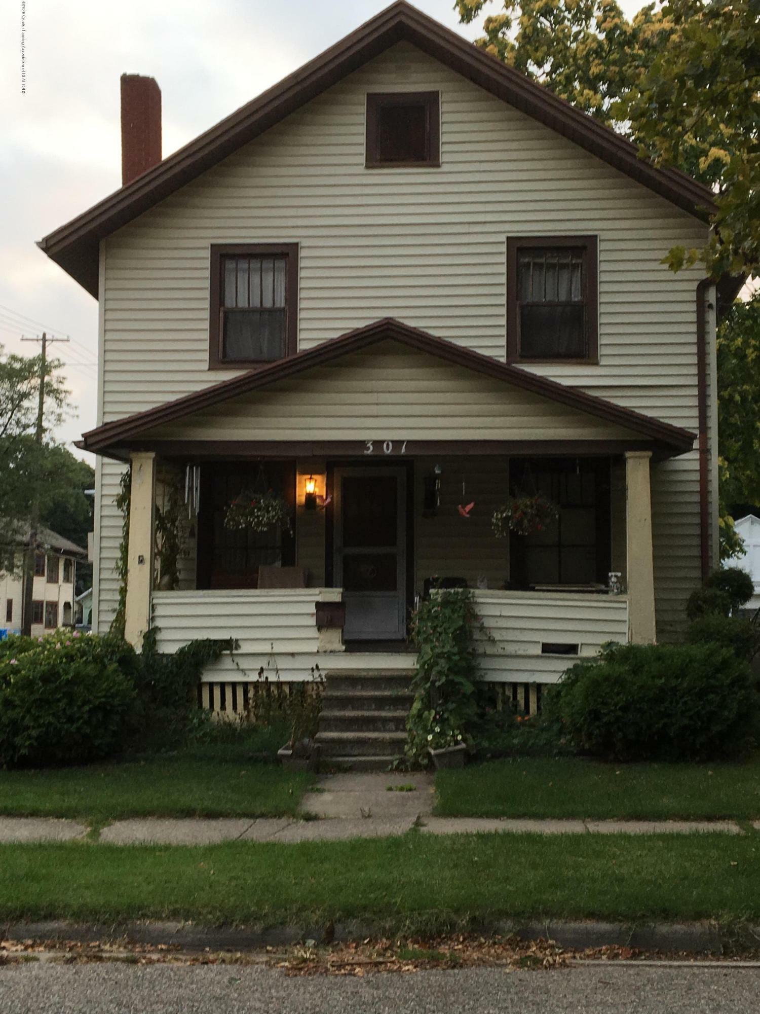 Property Photo:  301 N Foster Avenue  MI 48912 