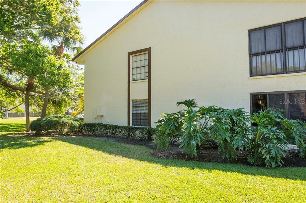 Property Photo:  2400 Winding Creek Boulevard 21A-104  FL 33761 