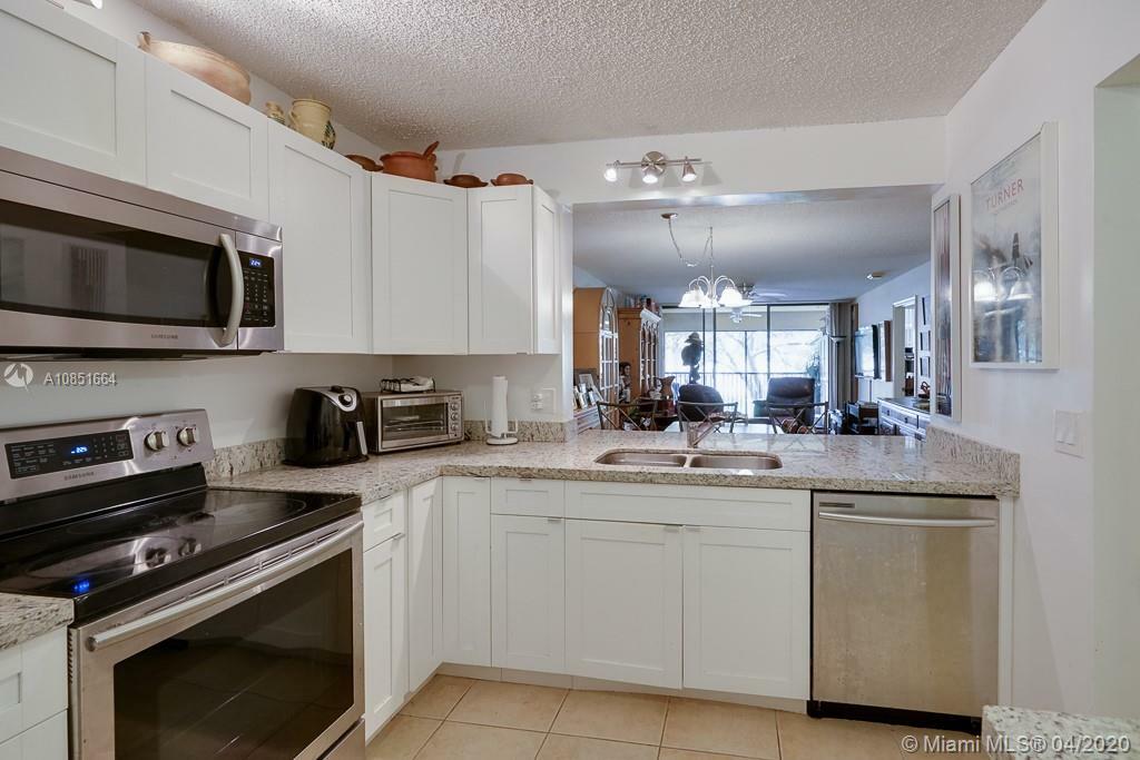 Property Photo:  8592 W Sunrise Blvd 205  FL 33322 