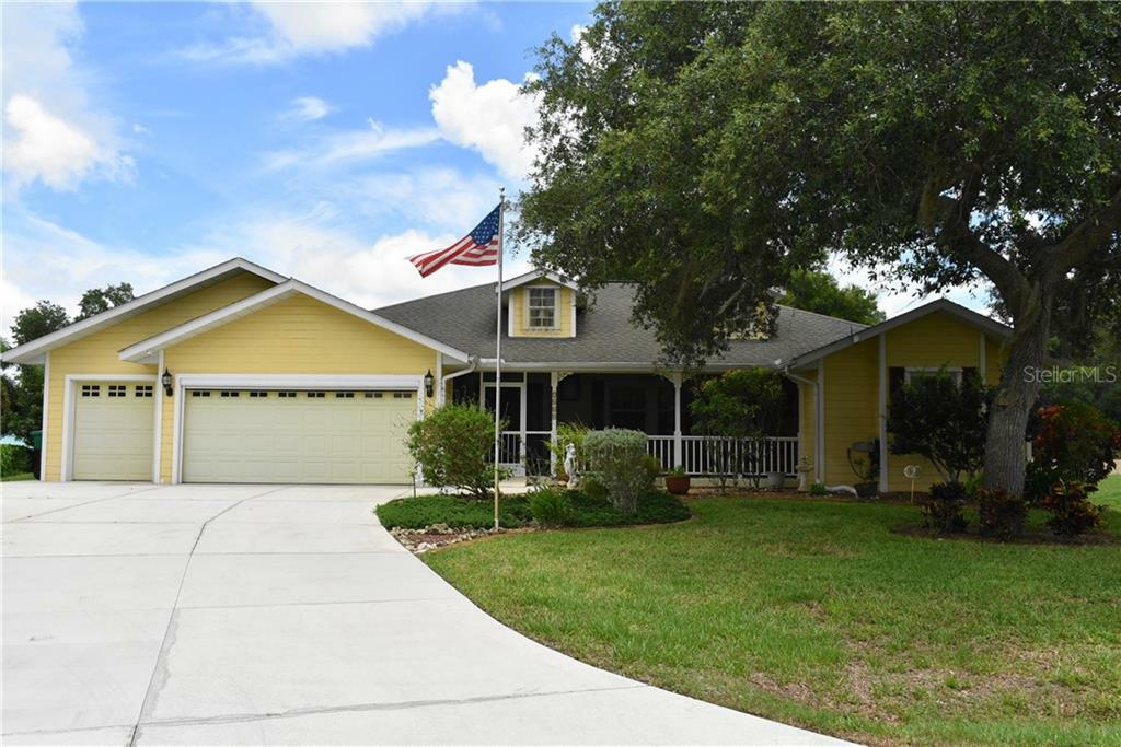 Property Photo:  2660 Pebble Creek Place  FL 33948 