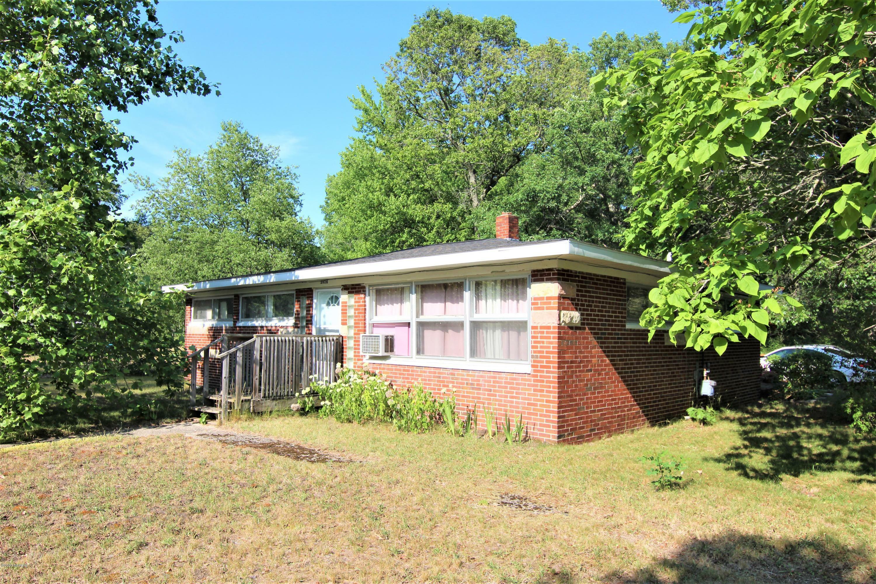 Property Photo:  2026 Russell Road  MI 49445 