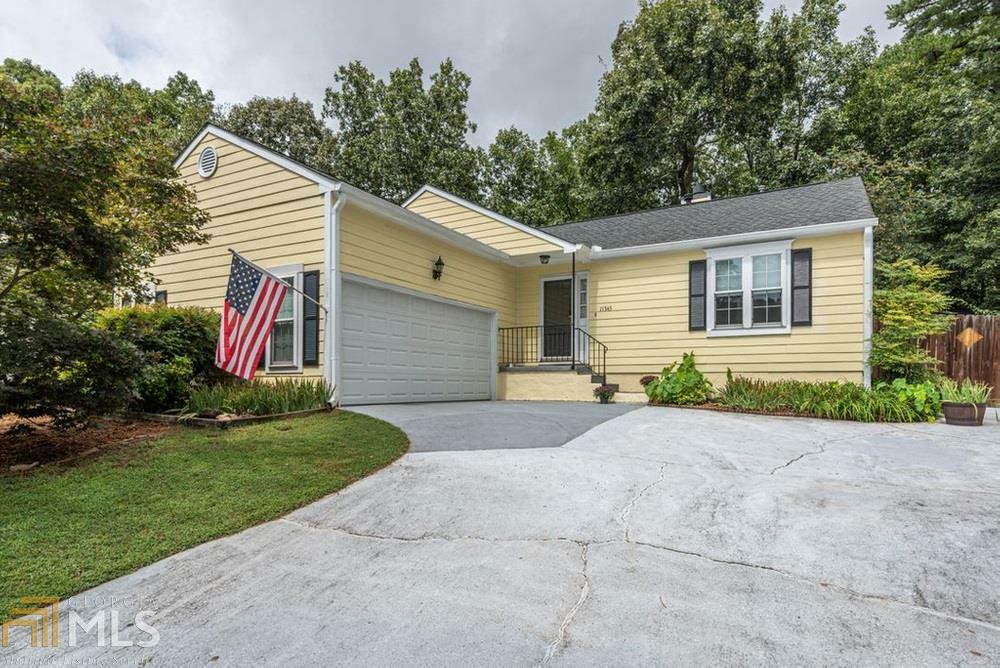 Property Photo: 11345 Abbotts Station Dr GA 30097
