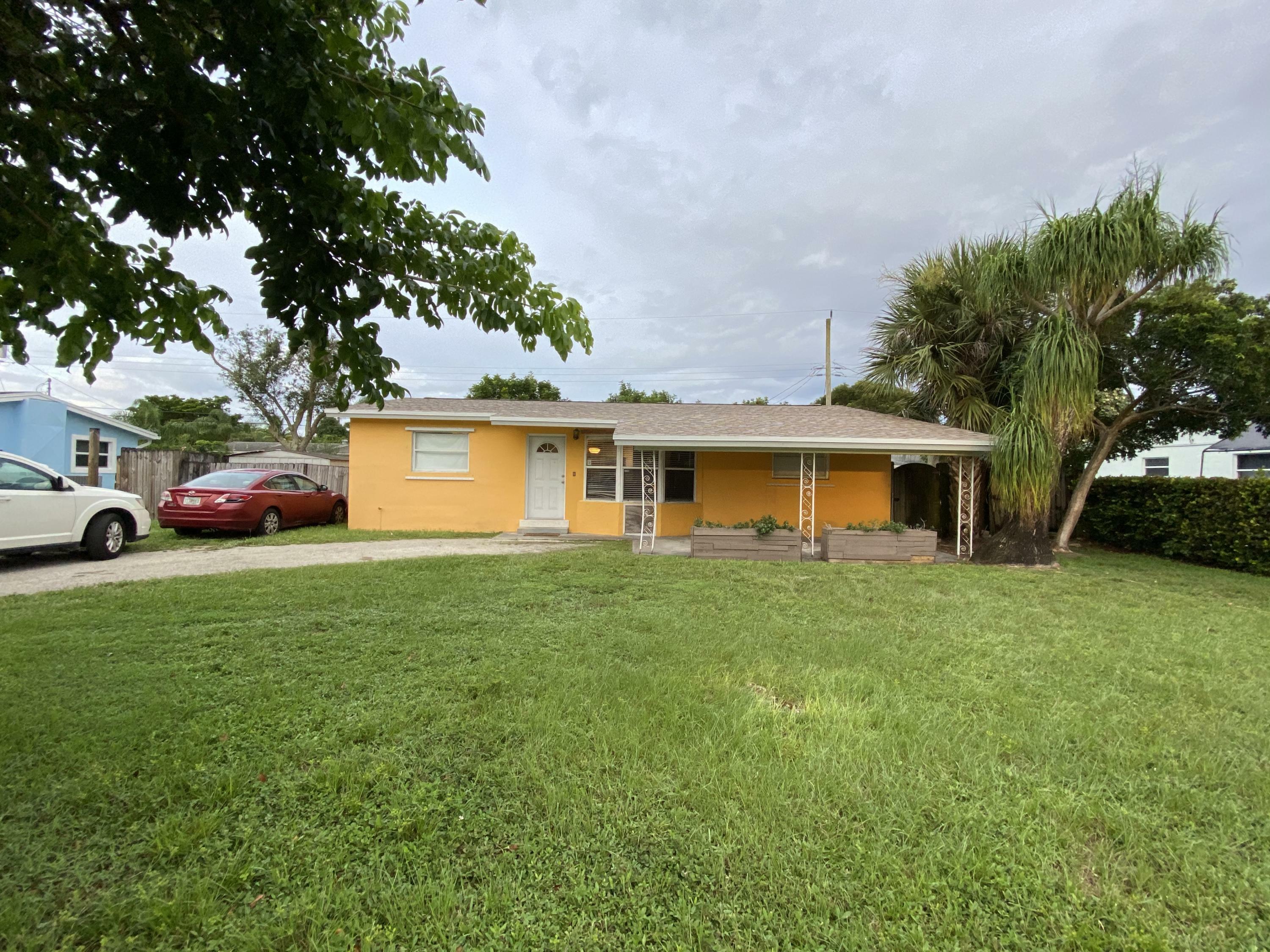 Property Photo:  908 Arlington Drive  FL 33415 