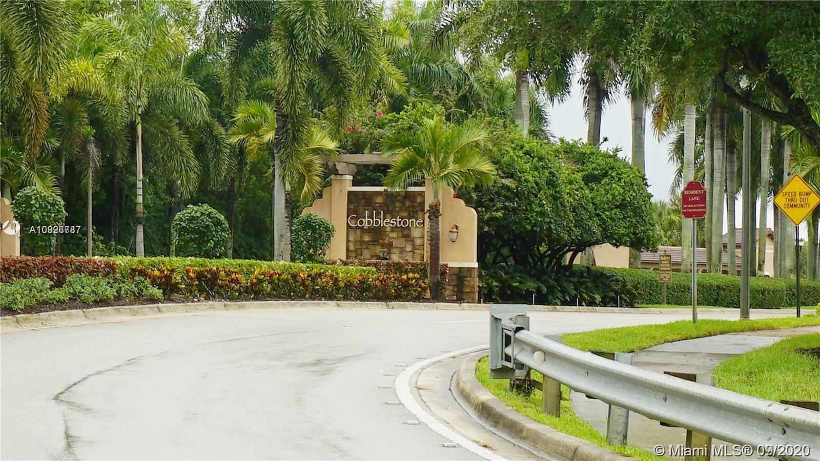 Property Photo:  475 SW 147th Ter 6-48  FL 33027 