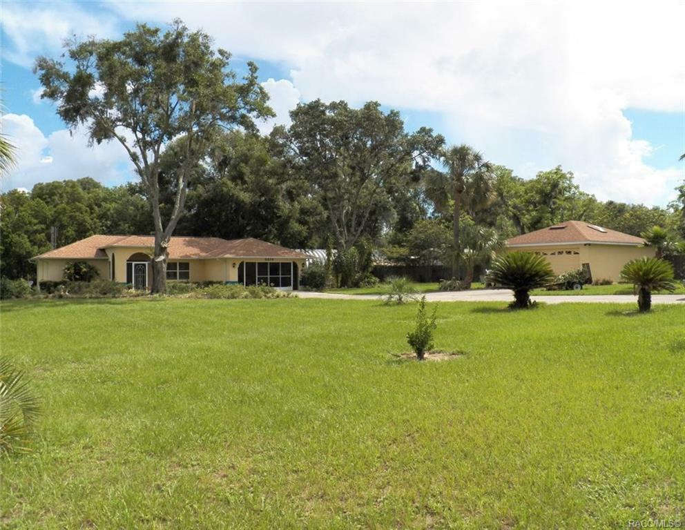 Property Photo:  5873 W Grovepark Road  FL 34433 