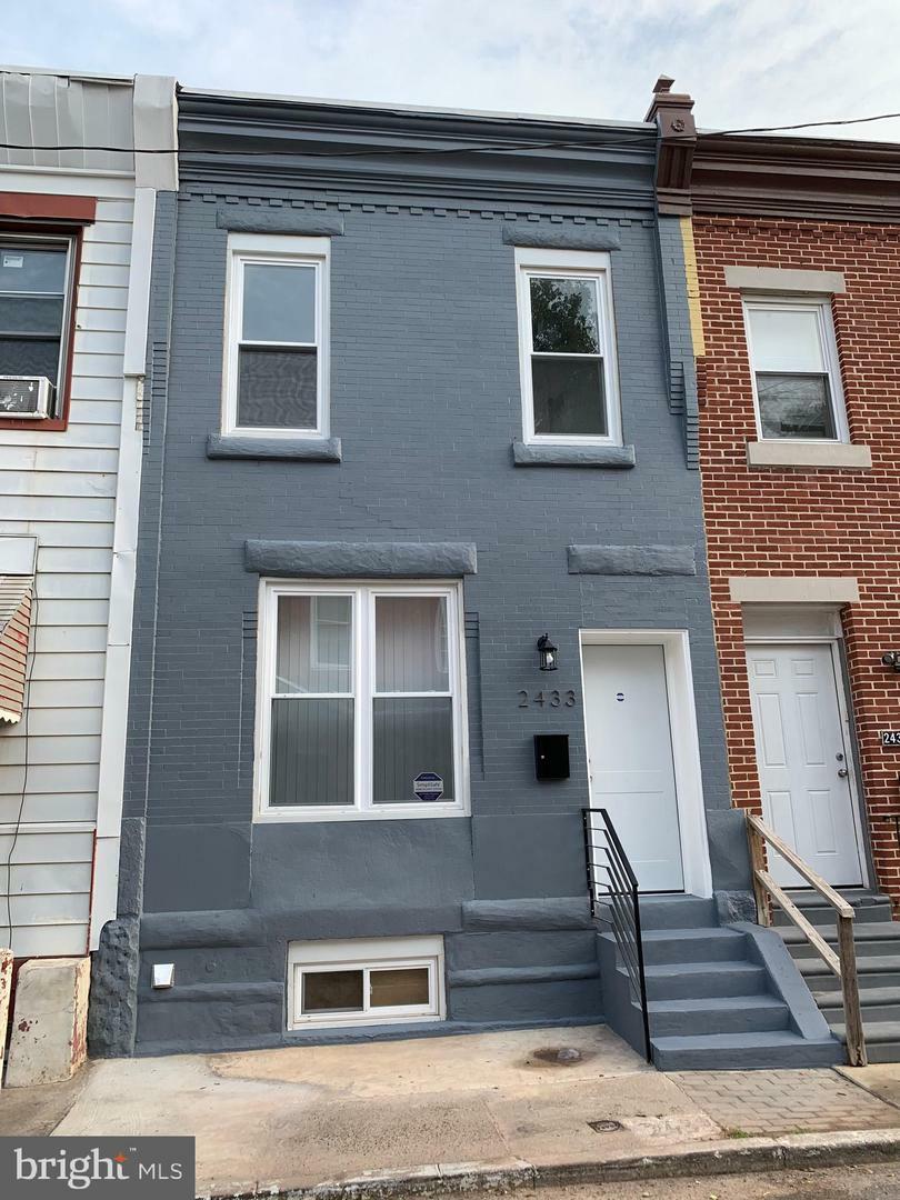 Property Photo:  2433 Arlington Street  PA 19121 