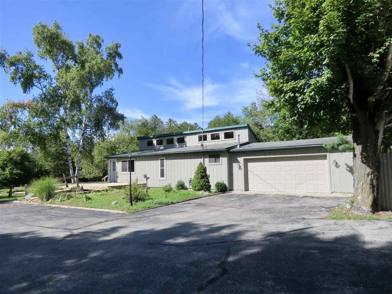 Property Photo:  211 Lyle  MI 49712 