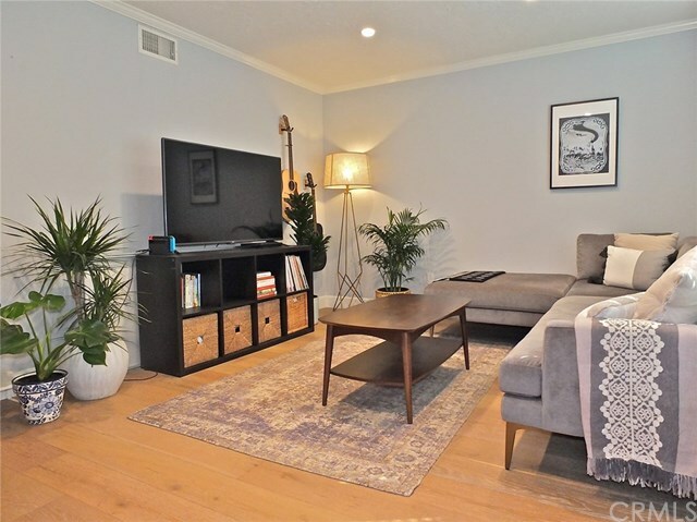 Property Photo:  16871 Limelight Circle C  CA 92647 