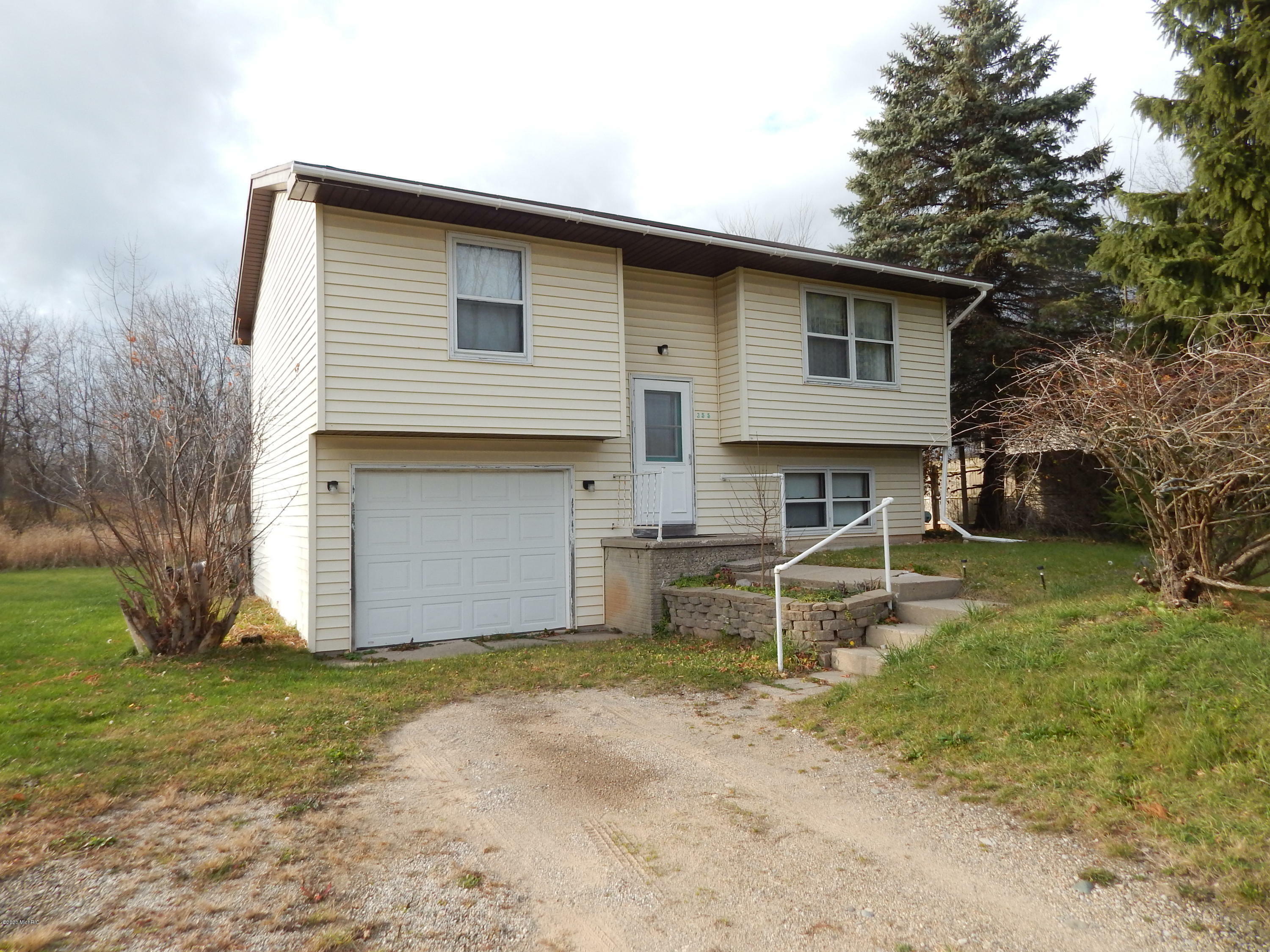 Property Photo:  355 River Road NW  MI 49345 