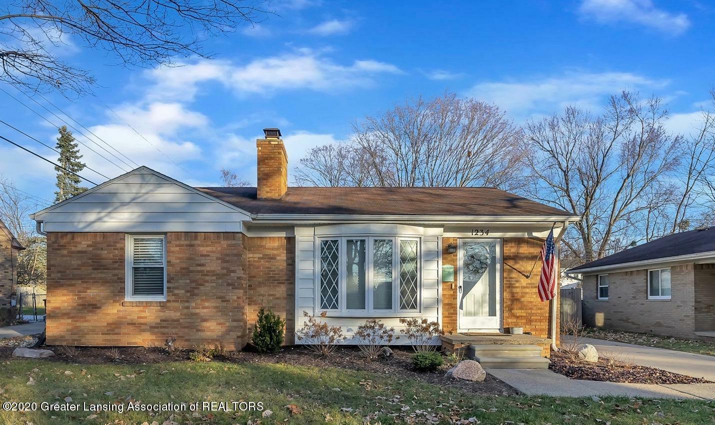 Property Photo:  1234 N Magnolia Avenue  MI 48912 