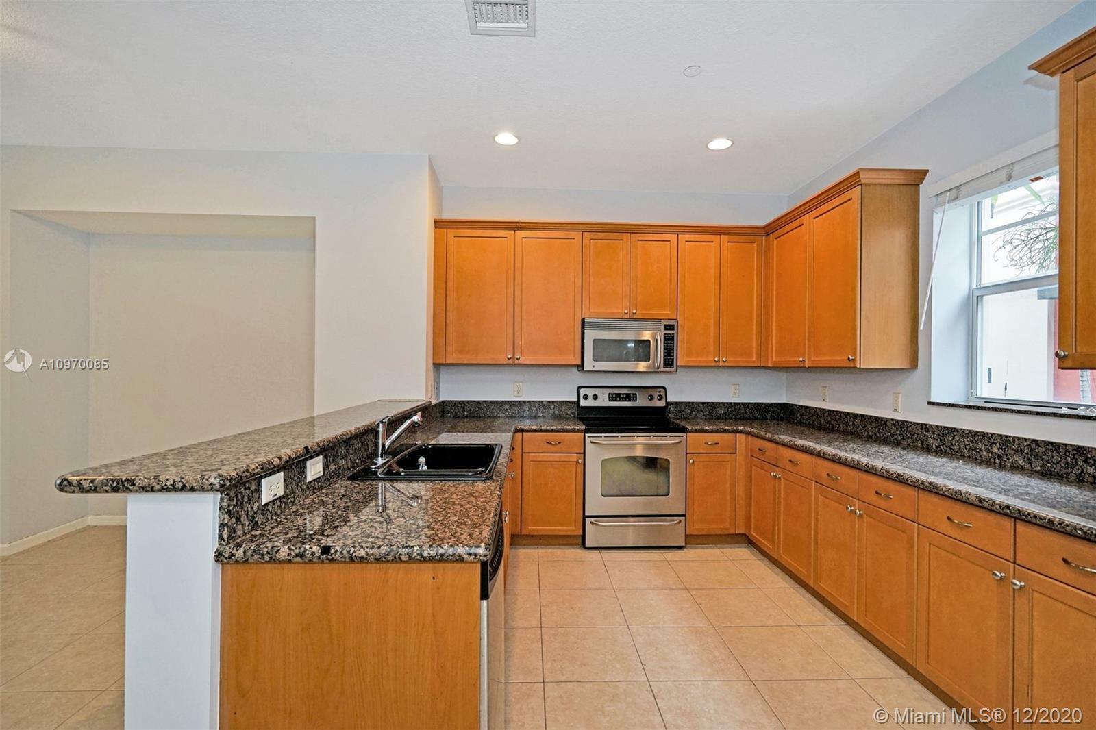 Property Photo:  1033 NE 17th Way 1302  FL 33304 