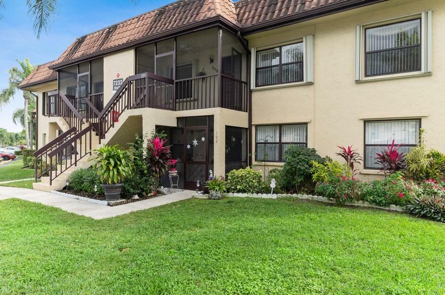 Property Photo: 7233 Golf Colony Court 203 FL 33467