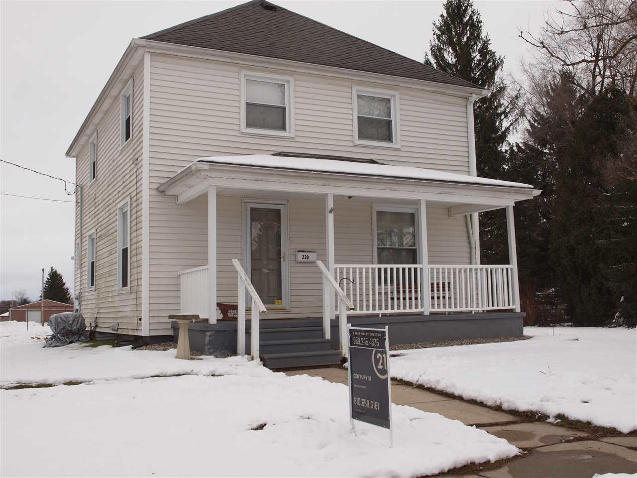 Property Photo:  220 N Comstock  MI 48817 