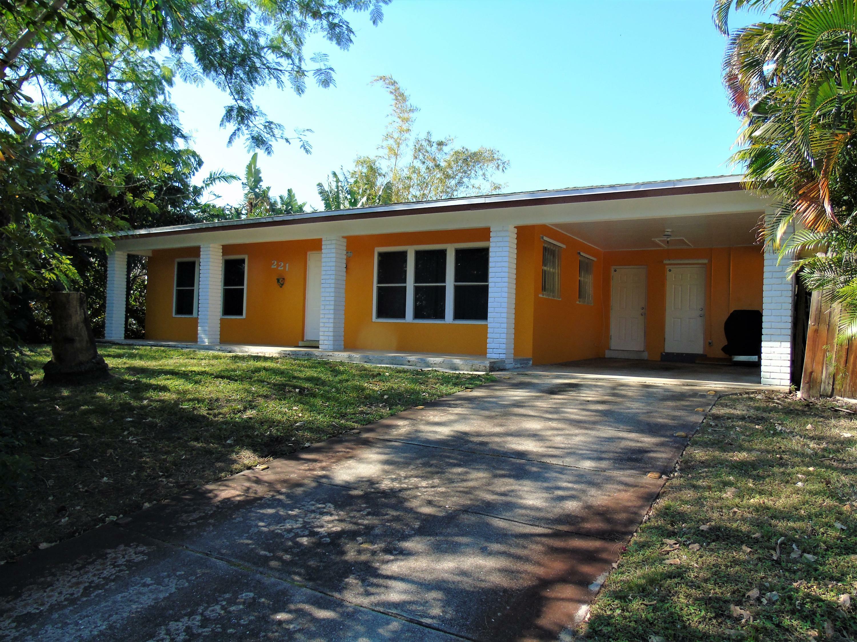 Property Photo:  221 SW 4th Street  FL 33435 