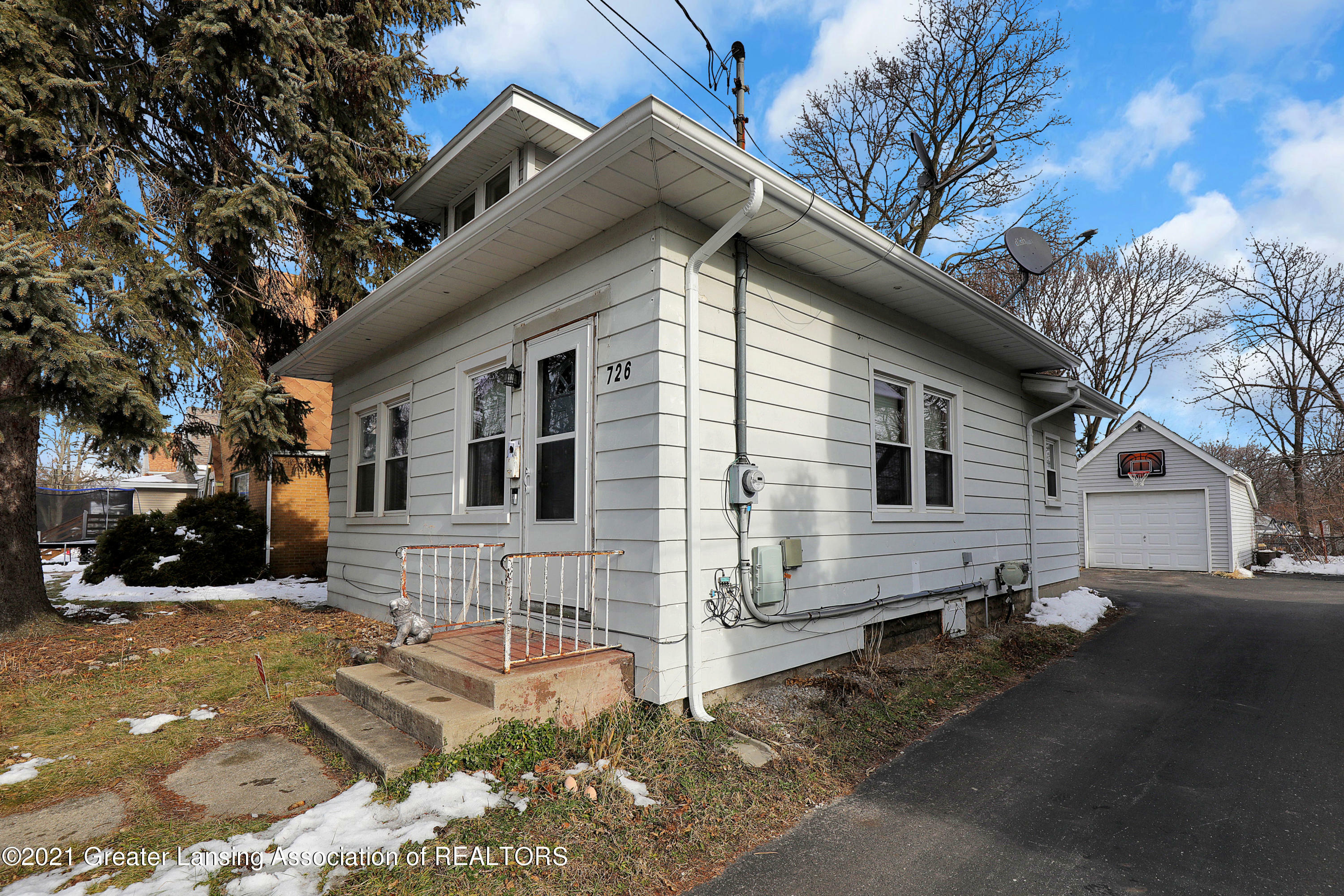 Property Photo:  726 Clark Street  MI 48906 