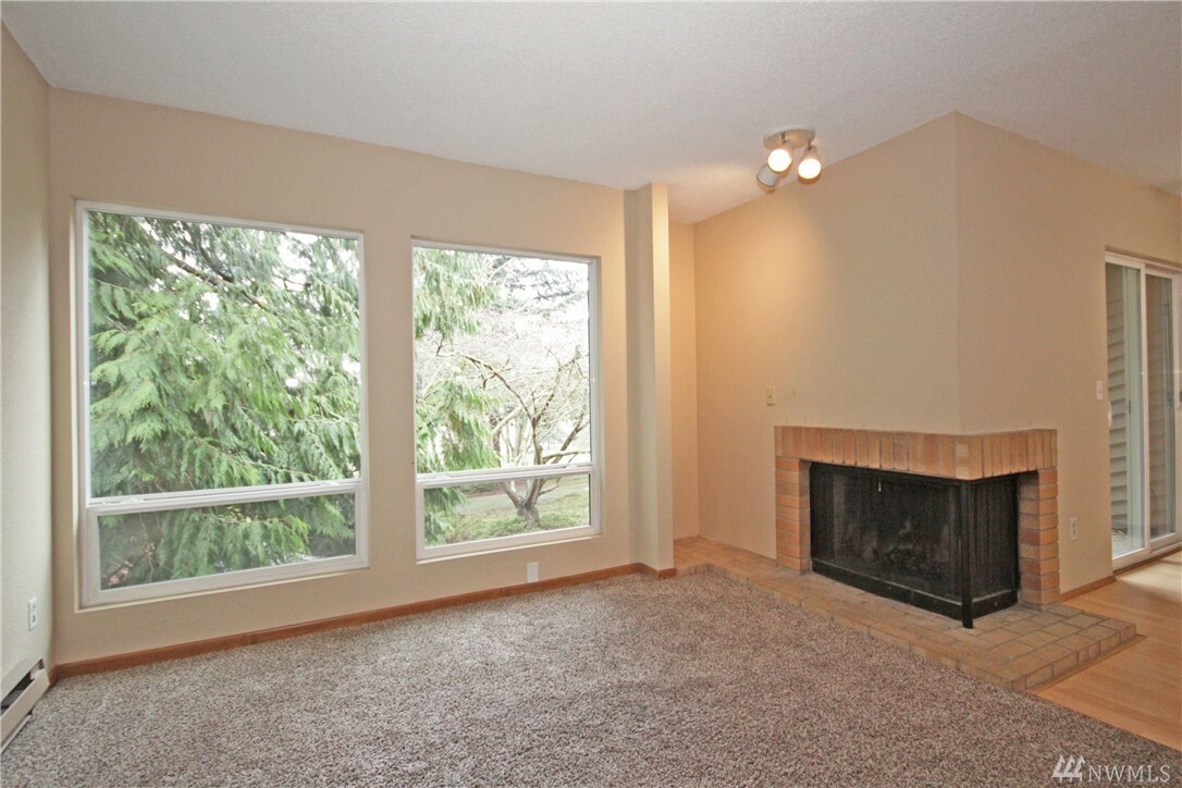 Property Photo:  15711 4th Ave S 23  WA 98148 