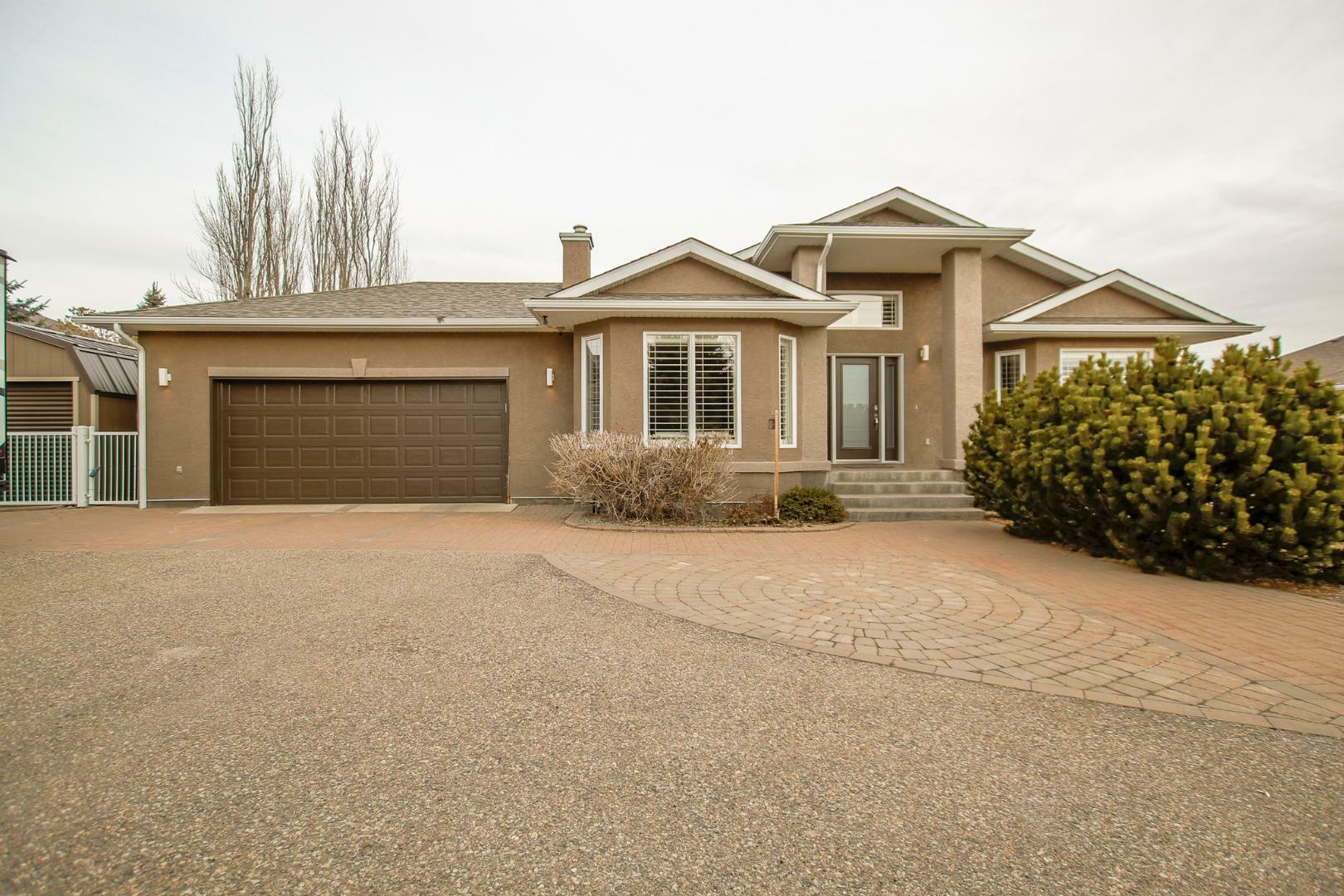 Property Photo: 2803 48 Avenue S AB T1K 7B3