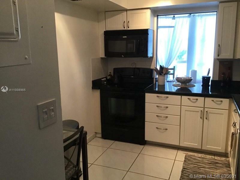 Property Photo:  851 Three Islands Blvd 318  FL 33009 