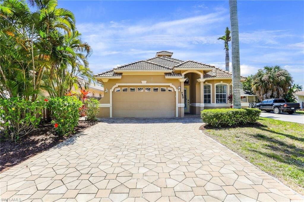 Property Photo:  750 107th Ave N  FL 34108 