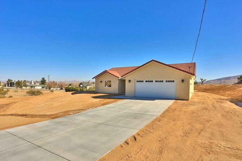 Property Photo:  9455 Jacaranda Avenue  CA 92345 