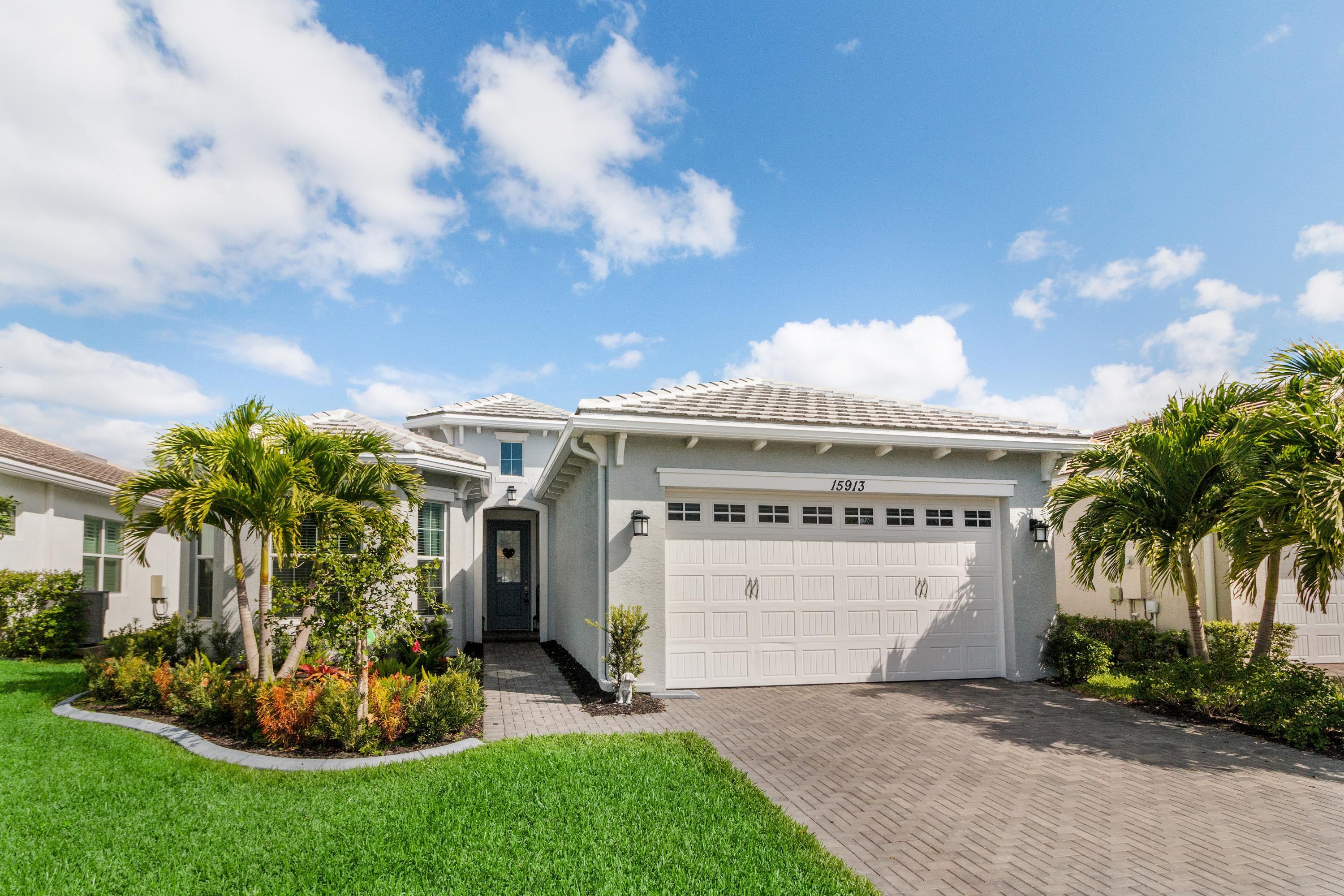 Property Photo:  15913 Rain Lilly Way  FL 33470 
