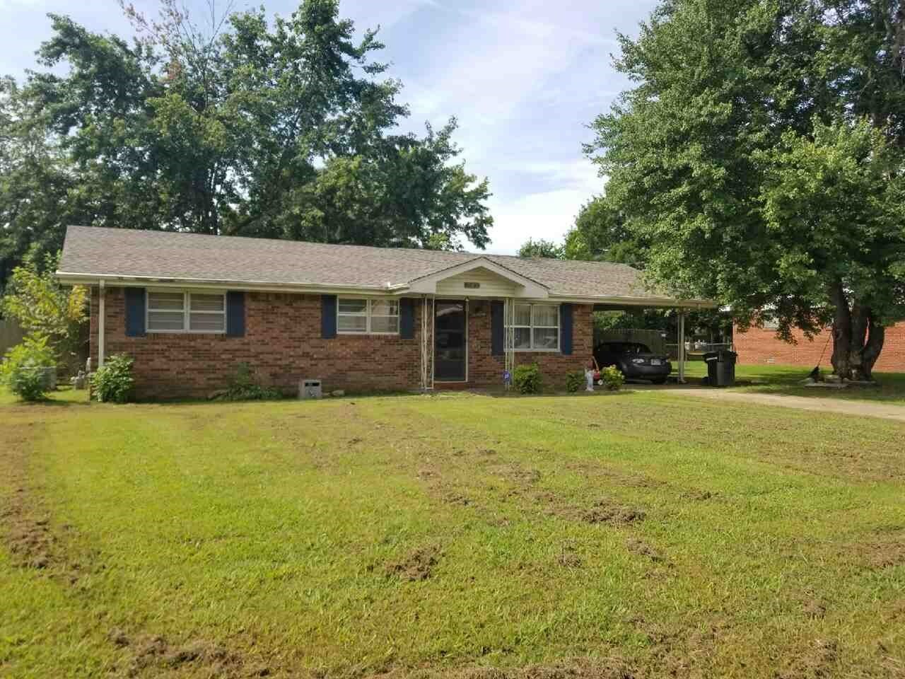 Property Photo:  303 Carson  AR 72416 