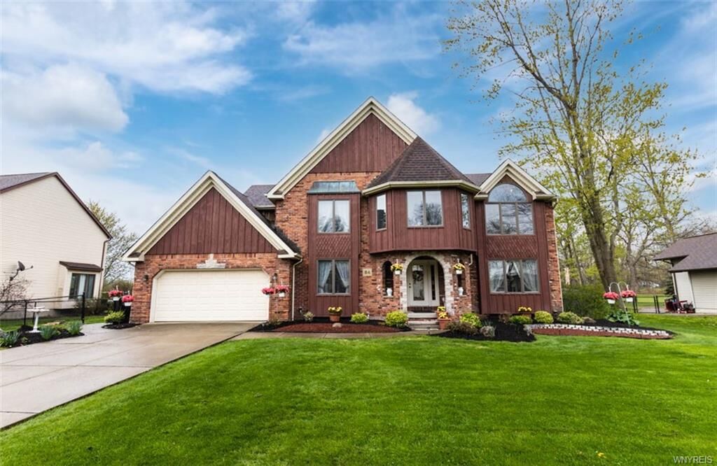 Property Photo:  84 River Oaks Drive  NY 14072 