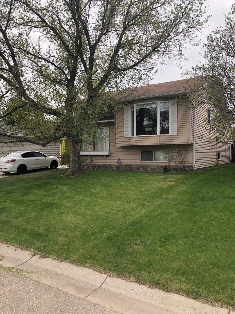 Property Photo: 159 Woodburn Crescent AB T1S 1L4