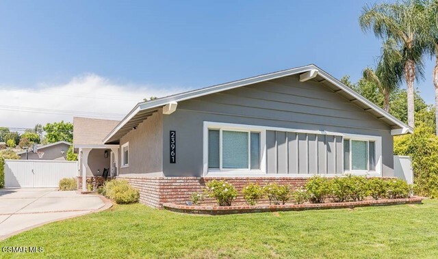 Property Photo:  23961 Hartland Street  CA 91307 