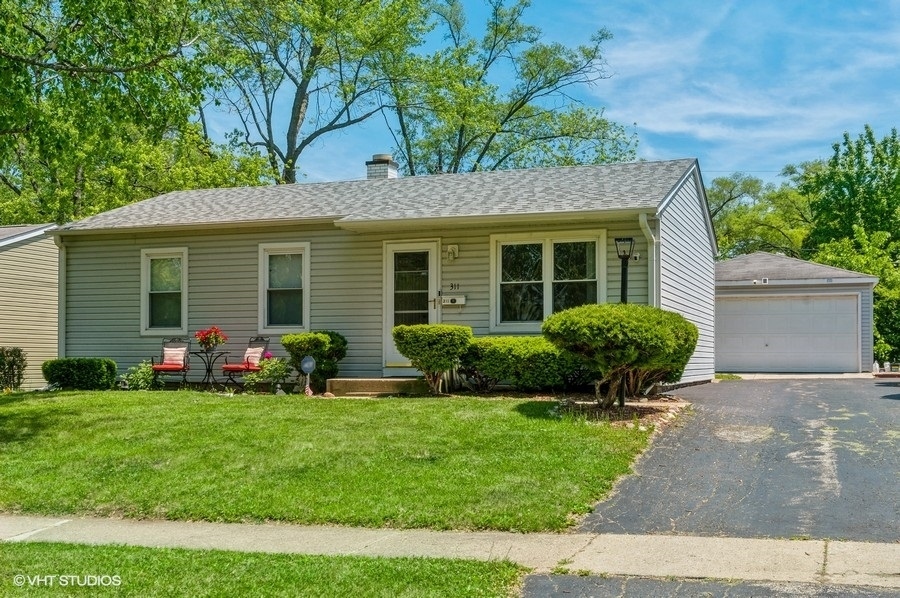 Property Photo:  311 Raupp Boulevard  IL 60089 