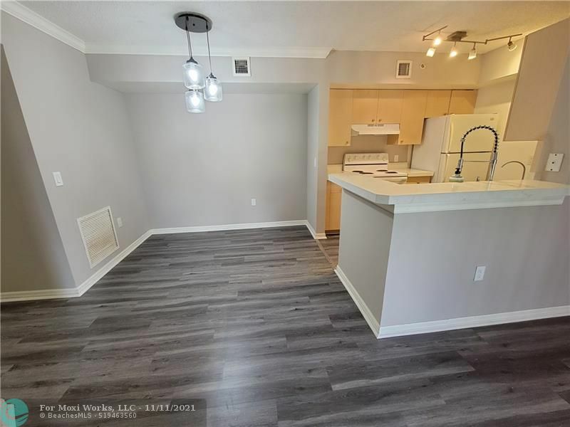 Property Photo:  2433 Centergate Dr 207  FL 33025 