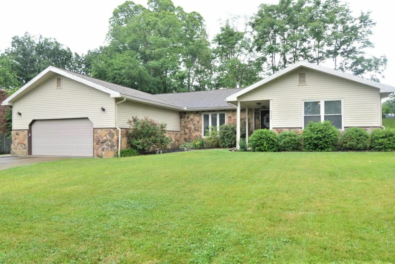 Property Photo:  7599 Woodland Drive  IN 47630-3218 