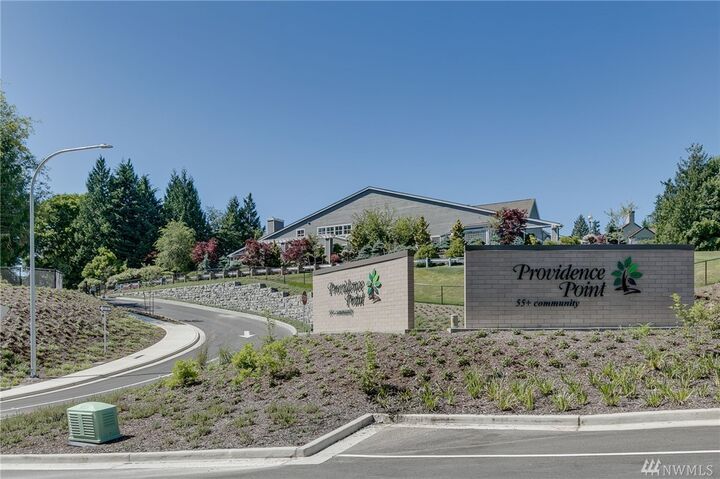 Property Photo: 4152 Providence Point Dr SE 102 WA 98029