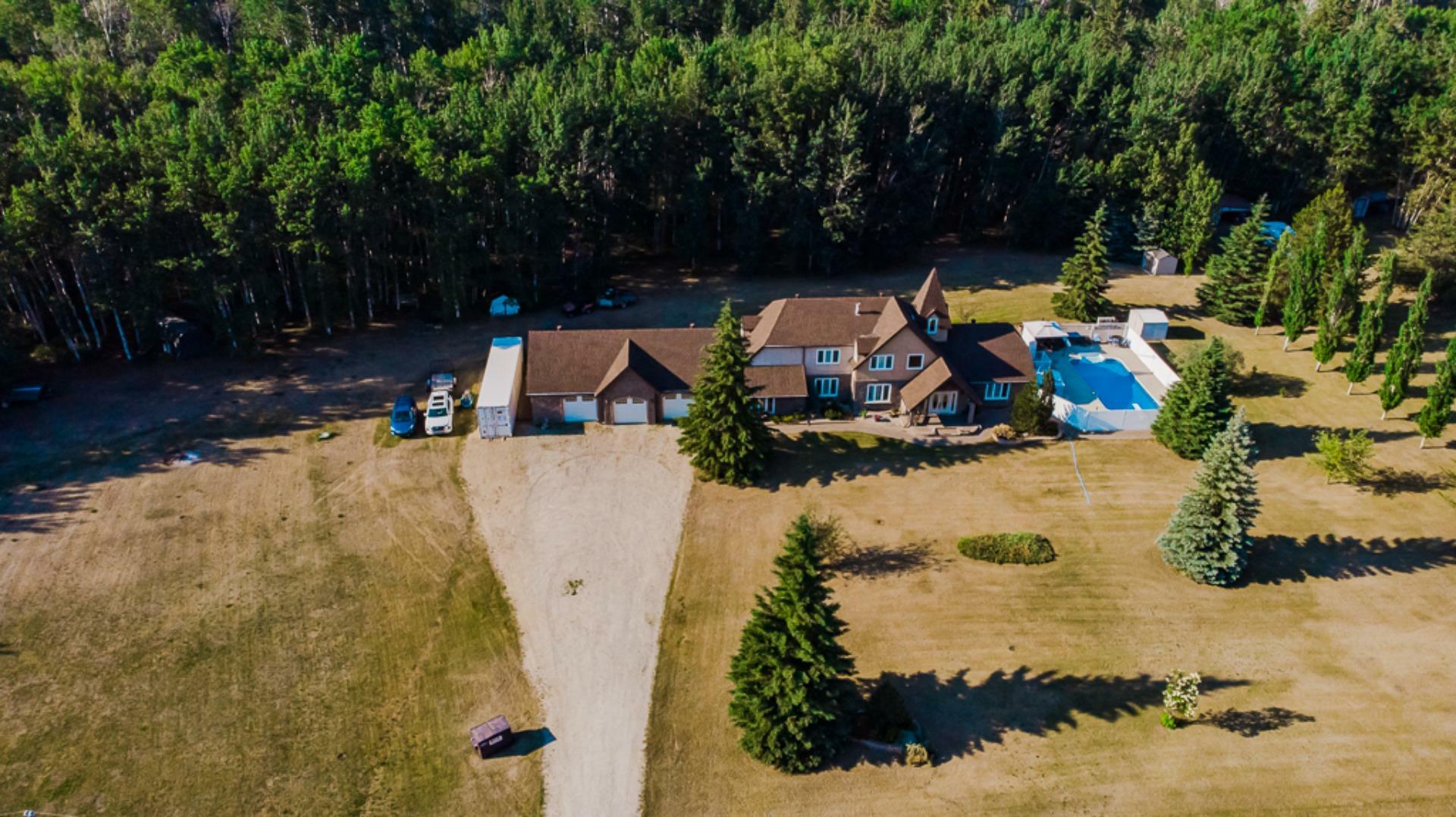 Property Photo: 85 704041 Rng Rd 72 AB T8W 5G2