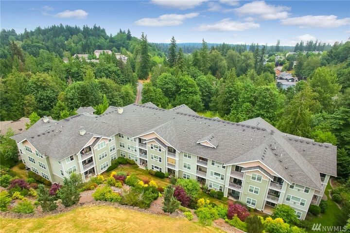 Property Photo:  4406 Providence Point Place SE 202  WA 98029 